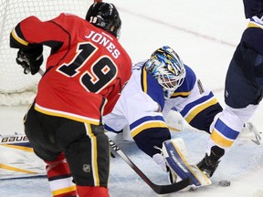 Calgary Flames forward David Jones is unable to score on St. Louis Blues goalie Brian Elliott during the second period on Tuesday night. The Flames couldn't beat Elliott at all as they were shut out 4-0.