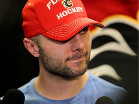 Calgary Flames captain Mark Giordano is emotional while talking to reporters about his season-ending biceps injury at a press conference on Tuesday.