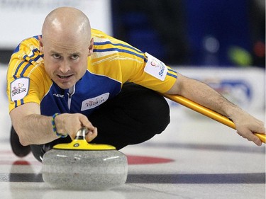 Alberta skip Kevin Koe delivered his rock during the afternoon draw against Newfoundland Labrador at the Tim Hortons Brier at the Scotiabank Saddledome in Calgary on March 4, 2015.