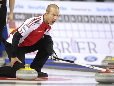 Team Canada skip Pat Simmons yells to his sweepers during the afternoon draw against Ontario during the Tim Hortons Brier at the Scotiabank Saddledome on March 4, 2015.
