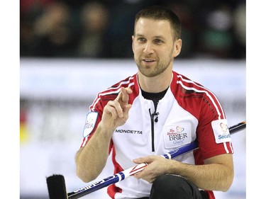 Newfoundland Labrador skip Brad Gushue crossed his fingers after making a shot during the afternoon draw against Alberta at the Tim Hortons Brier at the Scotiabank Saddledome in Calgary on March 4, 2015.
