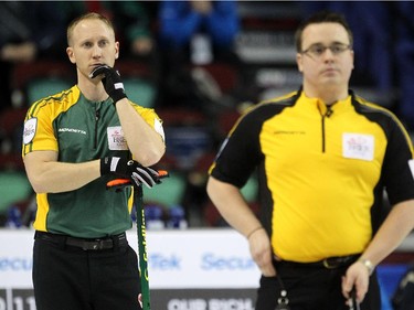 Northern Ontario skip Brad Jacobs kept an eye on the action during his game against New Brunswick during the Wednesday morning draw of the Tim Horton's Brier at the Scotiabank Saddledome on March 4, 2015.