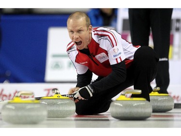 Team Canada skip Pat Simmons called to his sweepers from a house full of B.C's yellow rocks during the Wednesday morning draw of the Tim Horton's Brier at the Scotiabank Saddledome on March 4, 2015. Team Canada scored 2 in the final end to defeat B.C. 8-7.