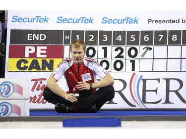 Team Canada second Carter Rycroft took a couple minutes to sit in front of the scoreboard during the fifth end break  of their game against PEI during the Tim Hortons Brier at the Scotiabank Saddledome on March 1, 2015. Team Canada was handed their second loss of the day losing 7-4 to PEI.