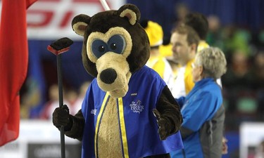 Reg Caughie did his thing dressed in his Brier Bear costume during the team parade prior to the afternoon draw of the Tim Horton's Brier at the Scotiabank Saddledome on March 4, 2015. Caughie has played the role of Brier Bear for the past 35 years.