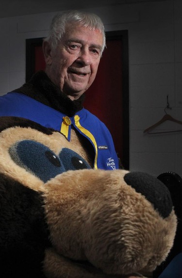 Reg Caughie prepared to return to the stands to entertain the crowd during the morning draw of the Tim Horton's Brier at the Scotiabank Saddledome on March 4, 2015. Caughie has played the role of Brier Bear for the past 35 years.