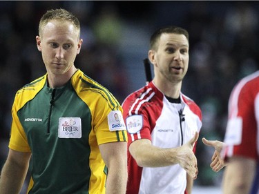 Northern Ontario skip Brad Jacobs walks off the ice after shaking hands with Newfoundland Labrador skip Brad Gushue during the morning draw of the Tim Hortons Brier at the Scotiabank Saddledome in Calgary on March 5, 2015. Newfoundland Labrador won 6-5 handing Northern Ontario its first loss of the Brier.