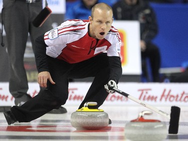 Team Canada skip Pat Simmons called to his sweepers at they played against Quebec during the morning draw of the Tim Hortons Brier at the Scotiabank Saddledome in Calgary on March 5, 2015. Both teams had a record of 6-3 going into the morning game and Team Canada claimed the win with a score of 7-5 over Quebec.