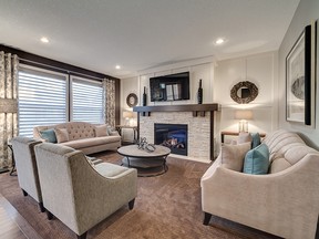 The great room in the Houston show home by Stepper Custom Homes in Kinniburgh, Chestermere.