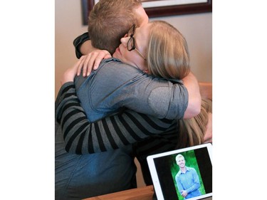 Grant Heffernan and his sister Nathalie Laquinta comfort each other after talking  about the death of their brother Anthony Heffernan, two days after he was shot by police in a northeast Calgary hotel room. Heffernan's family believes his death was not justified.