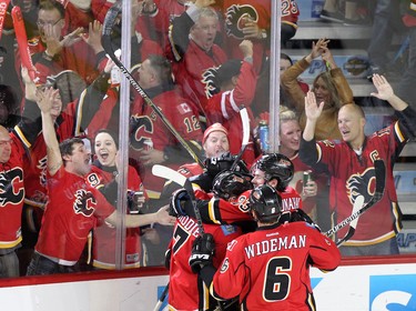 Calgary Flames celebrate a gaol on Vancouver Canucks during game 6 of the NHL Playoffs.