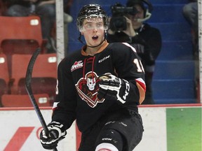 Jake Virtanen celebrates a goal against the Brandon Wheat Kings during the Western Hockey League semifinals. After the Hitmen were eliminated, Virtanen was sent to the American Hockey League's Utica Comets where he made his pro hockey debut on Monday.