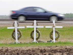 A memorial for three   victims killed along Highway 63 stands just outside the town of Grassland. Reader says the PC government has failed to keep its promises to fully twin the highway.