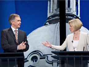 Alberta Progressive Conservative Leader Jim Prentice and NDP Leader Rachel Notley at the leaders debate in Edmonton on April 23, 2015.