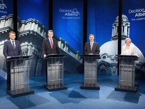 Wildrose Leader Brian Jean, Liberal Leader David Swann,  Progressive Conservative Leader Jim Prentice and NDP Leader Rachel Notley prepare for the recent televised debate. What should be the top priority for the winner of Tuesday's election?