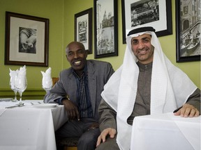 Sheikh Abdul Aziz bin Ali Al Nuaimi from the United Arab Emirates, right, nearly two years ago with his Calgary representative and restaurateur Marco Abdi at La Brezza at the time. Abdi died early this year.