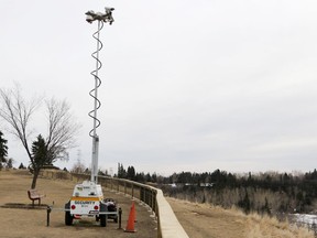 Cameras were set up on the ridge overlooking the Elbow River near Britannia Drive in Calgary on February 18, 2015.