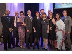 Cal 0502 Immigrant 6   Picture, from left,  at the 19th Annual Immigrants of Distinction Awards (IDA) "Inspiring New Stories" are Immigrant Services Calgary Board Members  Yohannes Afework, Robert Blain, board chair Josephine Pon, Paul Avender, Adam  Foster,  Roland Osske, vice -chair  Nicole Je lley,  Krystyna Biel, CEO, Josephine  Yam,  Hala Dehais,  IDA2015 chair and Raymond C.T. Cheung, treasurer.