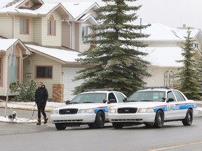Police remained on the scene in the 400 block of Hawkstone Drive N.W. Sunday morning. Three men are in custody following reports of shots fired at approximately 4:40 a.m.