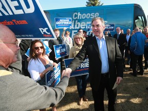 Alberta premier greets supporters during a campaign stop at Fish Creek Provincial park in Calgary on Friday April 10, 2015.