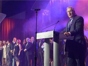 Calbridge Homes co-owner Larry Thomson at the podium after his company was named 2014 Multi-Family Builder of the Year at the Calgary Region SAM (Sales and Marketing) Awards on April 18, 2015.