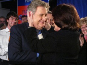 In this archive photo former premier Ralph Klein is embraced by his wife Colleen after his victory speech in Calgary. Photo by Grant Black/Calgary Herald