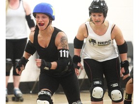 Jammer Kris Myass lets out a cheer after scoring during a Calgary Roller Derby Association scrimmage Thursday April 16, 2015. The team is going to South Carolina next week for Southern Discomfort tournament.