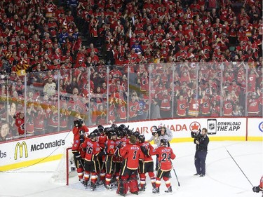 Calgary Flames celebrates their win against Vancouver Canucks during game 6 of the NHL Playoffs at the Scotiabank Saddledome in Calgary.