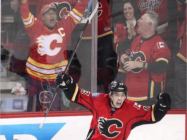 Calgary Flames rookie Johnny Gaudreau celebrates his goal on the Vancouver Canucks on Saturday. The Flames won 7-4 to eliminate the Canucks from the playoffs.