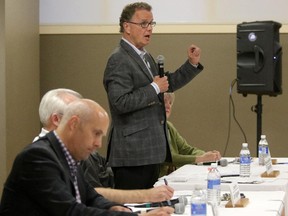 PC party Gordon Dirks, right, speaks during a candidates forum in Calgary-Elbow at the Rutland Community Hall  on April 26, 2015.