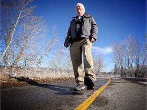 David Peyto is walking every street in Calgary and was on the Glenmore Reservoir pathway on April 7, 2015.