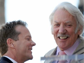 Canadian actor Kiefer Sutherland hugs his father, actor Donald Sutherland, after being honored with the 2,377th Star on the Hollywood Walk of Fame, December 9, 2008 in Hollywood, California. Sutherland stars as Jack Bauer in the show "24."