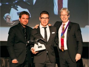 Albi Homes was named Canadian Home Builders Association's 2014 Grand SAM Builder of Excellence.
From left, Jason Mauro, Senior VP-Product Development Albi Homes, Allan Klassen, President and Managing Partner Albi Homes, Bard Golightly, President Canadian Home Builders Association.