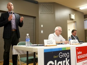 Alberta Party leader Greg Clark, left, Liberal candidate John Roggeveen and PC candidate Gordon Dirks are pictured during a candidates forum in Calgary Elbow at the Rutland Community Hall  on April 26, 2015.