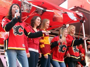 Members of the Cowtown Opera performed in the fan zone as hockey fans got geared up for Game 4 of the playoffs between the Calgary Flames and the Vancouver Canucks at the Scotiabank Saddledome on April 21, 2015.