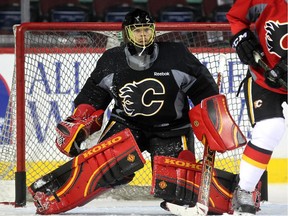 Calgary Flames goalie Jonas Hiller kept his eye on the play as he skated during practice on April 28, 2015 as the team prepared for their second round playoff round against the Anaheim Ducks.