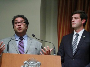 Calgary Mayor Naheed Nenshi, left, and Edmonton Mayor Don Iveson are seen together. "I'm not taking any kind of partisan position in the race," Iveson says of the current provincial election.