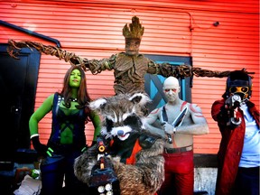 Guardians of the Galaxy costumes pose for a photo during the 2015 Calgary Comic Expo Parade of Wonders.