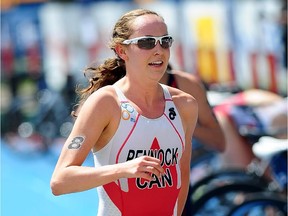 Calgary's Ellen Pennock, seen racing in the Elite Women's race at the 2013 Edmonton ITU Triathlon World Cup, is targeting a return to top form by the summer after injuries.