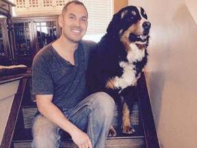 Elvis Xerri and his girlfriend were asleep at his property in Priddis when Boomer, a nine-year-old Bernese mountain dog, was attacked by a cougar on April 13, 2015. Xerri fought off the cougar and saved the pooch. Photo Elvis Xerri/For the Calgary Herald