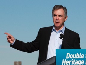 Jim Prentice announces his government would increase contributions to the Heritage Trust Fund during a campaign stop above Fish Creek Provincial park in Calgary on Friday April 10, 2015.