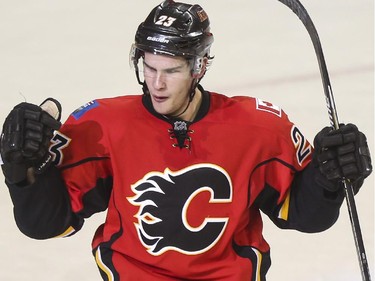 Calgary Flames Sean Monahan celebrates after sealing the deal and scoring the Flames' fourth goal during playoff action against the Vancouver Canucks at the Saddledome in Calgary, on April 19, 2015.