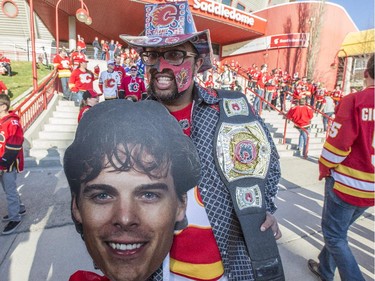 Lincy Mathew is all decked out in Calgary Flames paraphernalia and heads into the Flames first playoff home game in six years at the Saddledome in Calgary, on April 19, 2015.