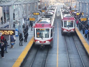 Commuters at the City Hall CTrain station. Gavin Young/Calgary Herald