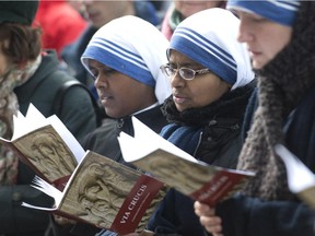 Nuns sing during the Stations of the Cross on Good Friday in Montreal. Christianity is alive and well in Canada, Rob Breakenridge says.