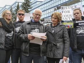 Anthony Heffernan's family, from left, sister Natalie Iaquinta, brother Joe, father Patrick, mother Irene, and brother Grant, speak at a rally organized by Cop Block Calgary in Calgary, on April 4, 2015. Approximately 100 supporters came out to rally for Anthony Heffernan, who was killed in a police-involved shooting on March 16, 2015.