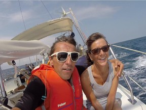 Loretta Reinholdt, 54, and Andy Wasinger, 46, of Calgary, are happy to be alive after they were held up on March 28, 2015, by pirates armed with guns and knives while on a sailing trip in Honduras, and stranded for four days in a jungle with nothing but peanut butter and cheese to eat and rain water to drink. This is from the morning before the pirate attack.