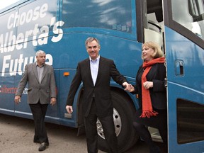 Alberta Premier Jim Prentice and his wife Karen Prentice arrive for the announcement of an election in Edmonton, on Tuesday, April 7, 2015.