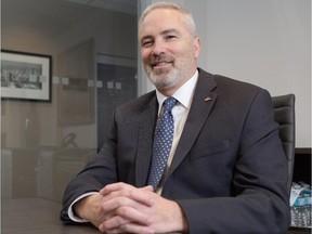 Jeff Robinson, regional managing consultant for international consulting firm Kepner Trego, in the firm's boardroom at Sun Life Plaza in Calgary on April 6, 2015.