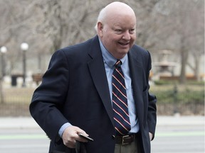 Suspended Senator Mike Duffy arrives at the courthouse for his trial in Ottawa, April 17, 2015.
